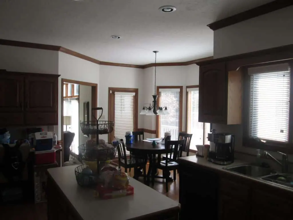 Before photo — Guy Painting Wood Trim