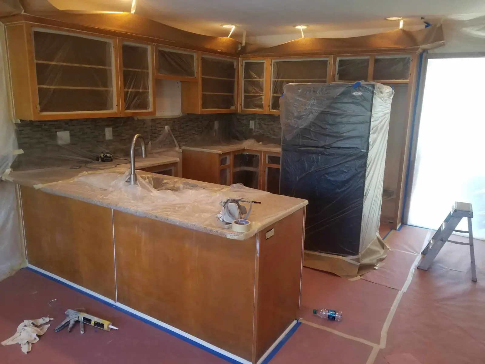 Kitchen cabinet painting project photo.