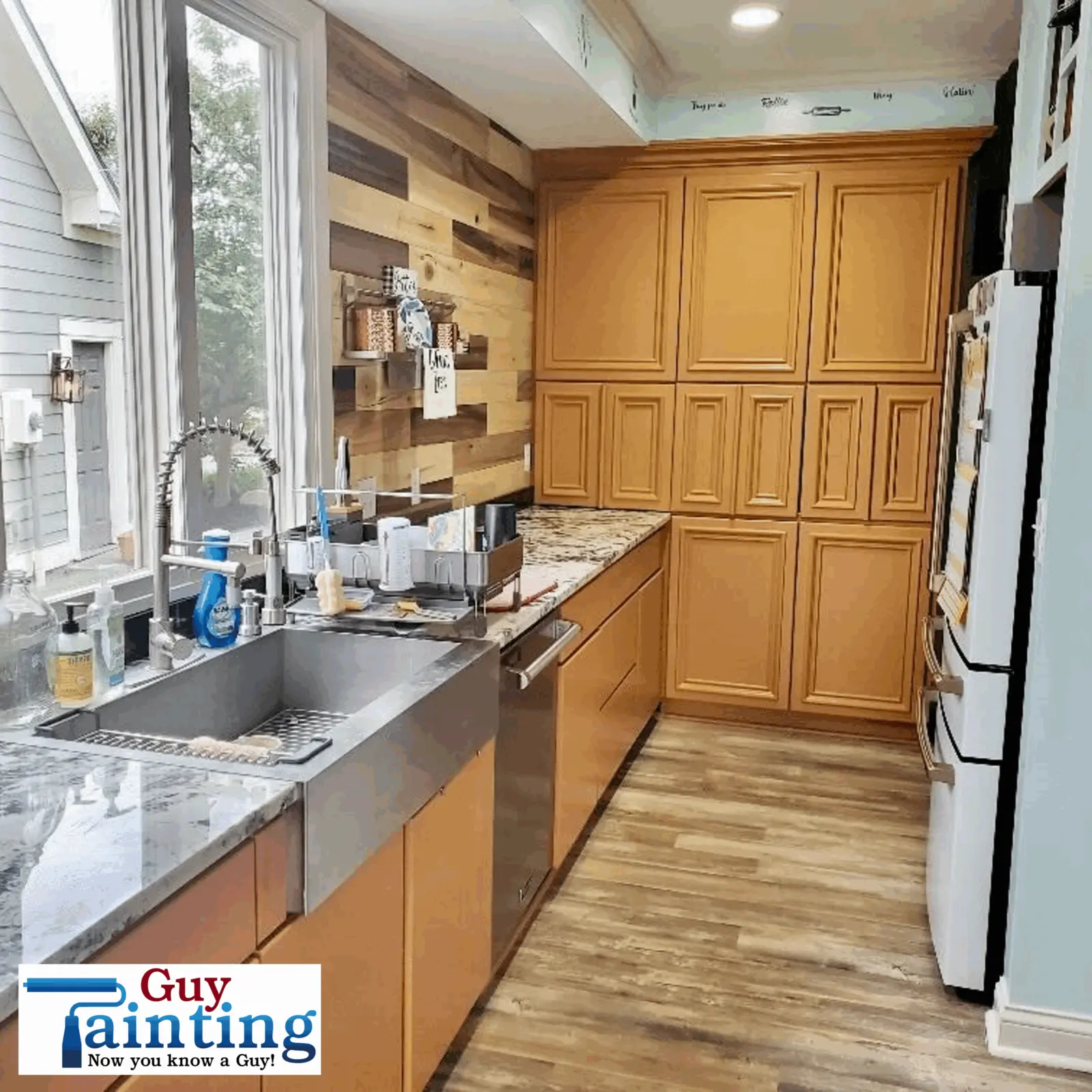 Cabinet painter in Geist painted kitchen cabinets in a light brown-orange color