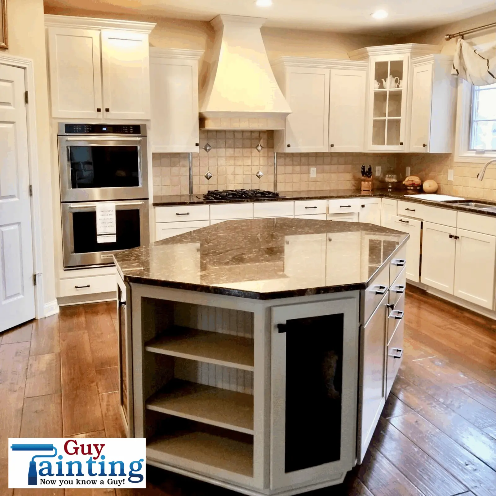 Painting cabinets in Carmel with Origami White, island painted with Taupe Tone