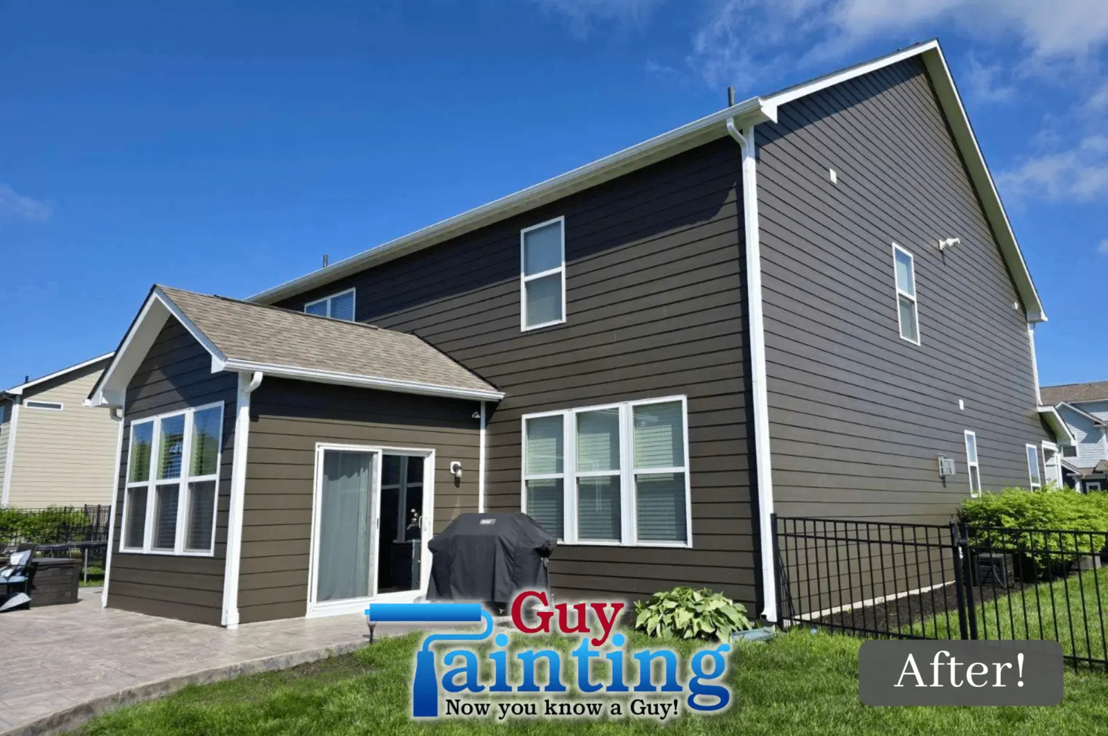 Same Noblesville home after Guy Painting repainted the siding Sherwin-Williams Black Fox with Extra White trim